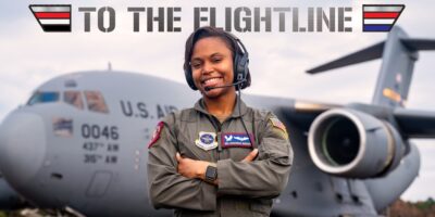 C-17 loadmaster poses in front of Globemaster III